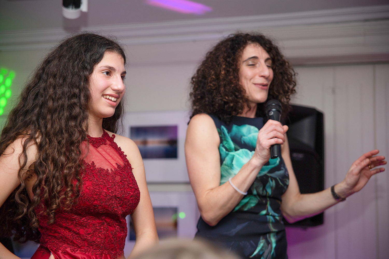 Mum and daughter making speech at party