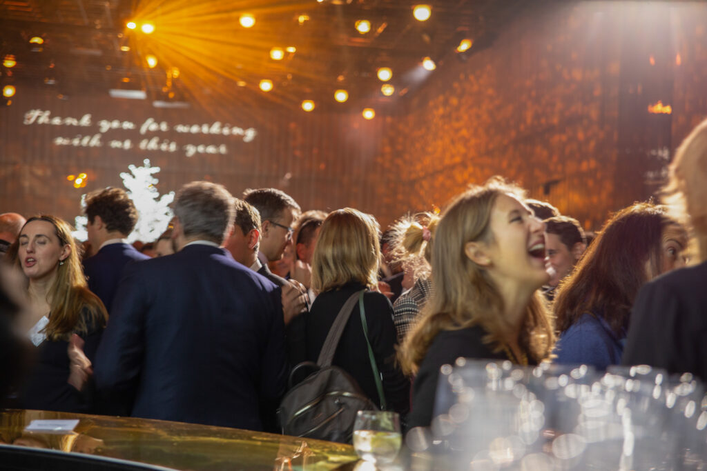 Woman laughing at corporate event